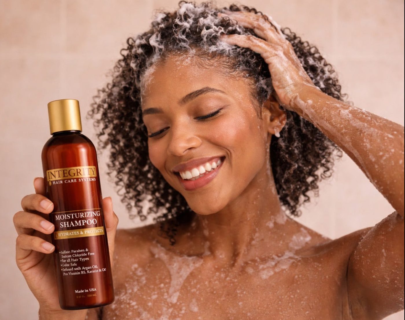 Woman washing her hair with Integrity Moisturizing Shampoo